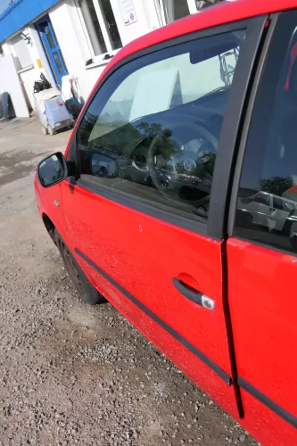 VW Lupo Seat Arosa Tür vorne links Fahrertür rot LP3G (mechanischer FH) (168877)