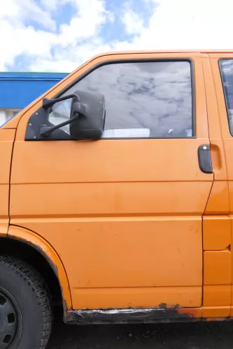VW T4 Tür vorne links orange LP2C Fahrertür 701831055H bis ca1996 ohneAnbauteile