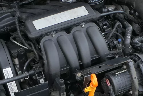 VW Golf 5 Caddy Ansaugbrücke Saugrohr 06A133203EM 1,6 75kw BGU BSE BSF