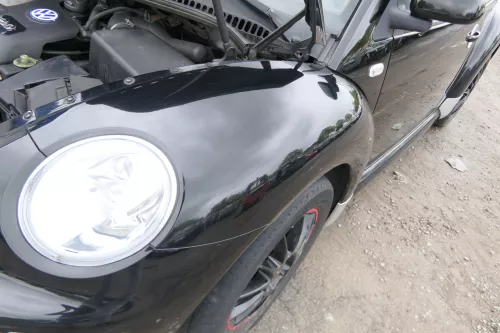 VW New Beetle 9C Kotflügel vorne links schwarz L041 1C0821103H (175354)