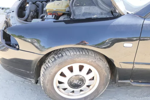 Audi A4 B5 (ab ca Ende1999 Facelift) Kotflügel vorne links schwarz LZ9W