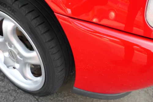 VW Polo 6N Stoßstange vorne breite Styling XXL Frontstoßstange rot LP3G + Gitter (177005)