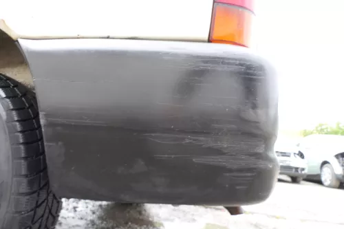 VW T4 Caravelle Multivan Stoßstange Heckstoßstange hinten 701807417 schwarz (177136)