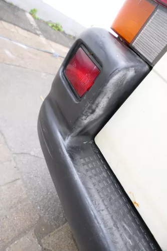 VW T4 Caravelle Multivan Stoßstange Heckstoßstange hinten 701807417 schwarz (177136)