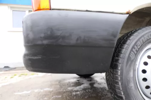 VW T4 Caravelle Multivan Stoßstange Heckstoßstange hinten 701807417 schwarz (177136)