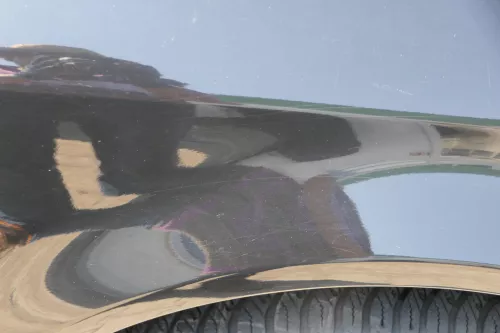 Audi A4 8E B6 Kotflügel vorne rechts schwarz LY9B - Delle nähe Stoßstange unten (181511)